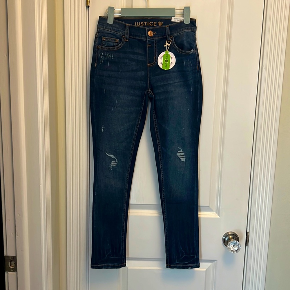 New with tags. Justice Jegging jeans. Size 14.